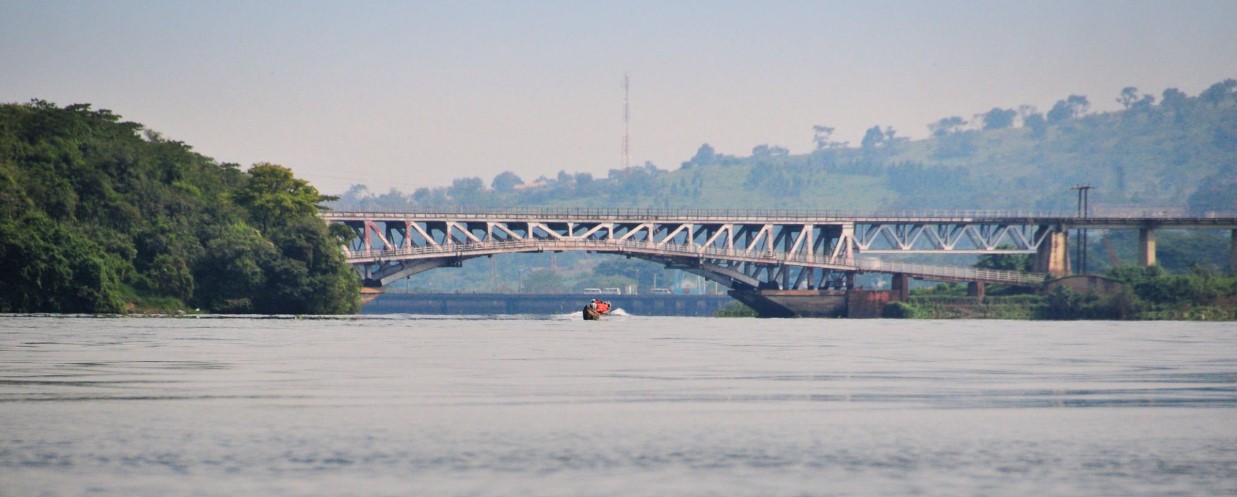 Tourists on a 9-day Uganda safari, enjoying gorilla trekking, game drives, boat safaris, and cultural experiences in Jinja and national parks