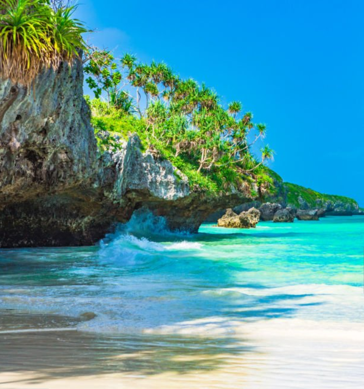 Beautiful Nungwi Beach with clear turquoise waters, white sand, and stunning sunset views.