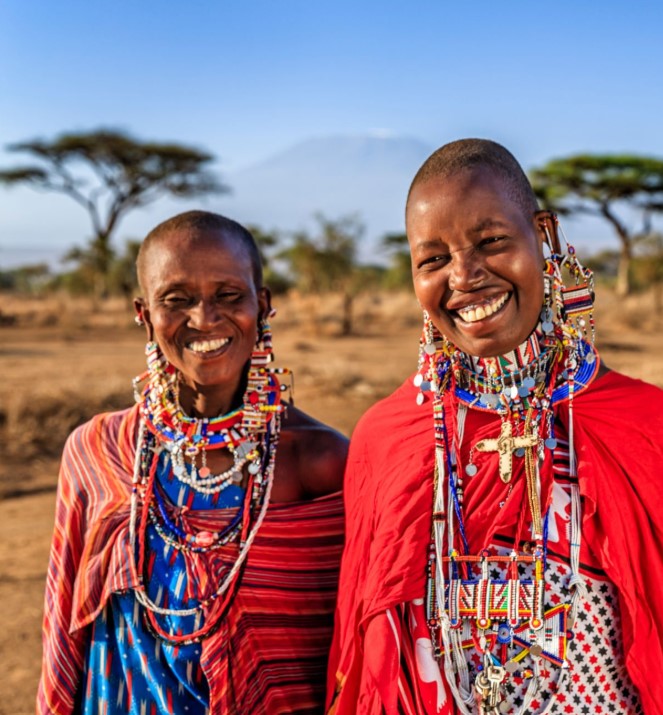 Masai Villages. Maasai warrior in traditional dress performing a cultural dance.