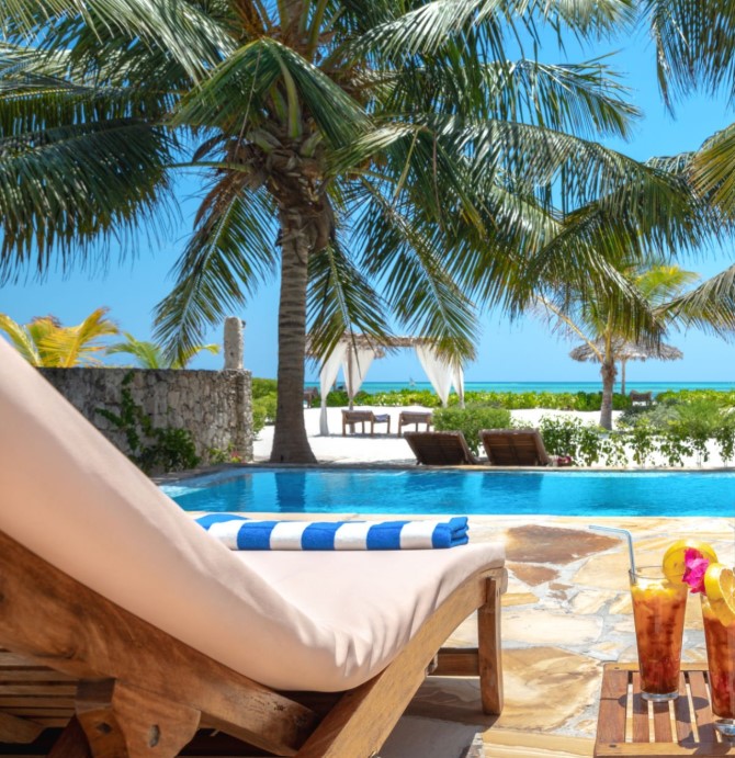 A tranquil beach resort in Zanzibar with white sands and palm trees