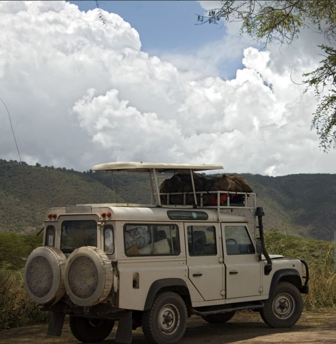 Traveller enjoying scenic overland drive in Tanzania