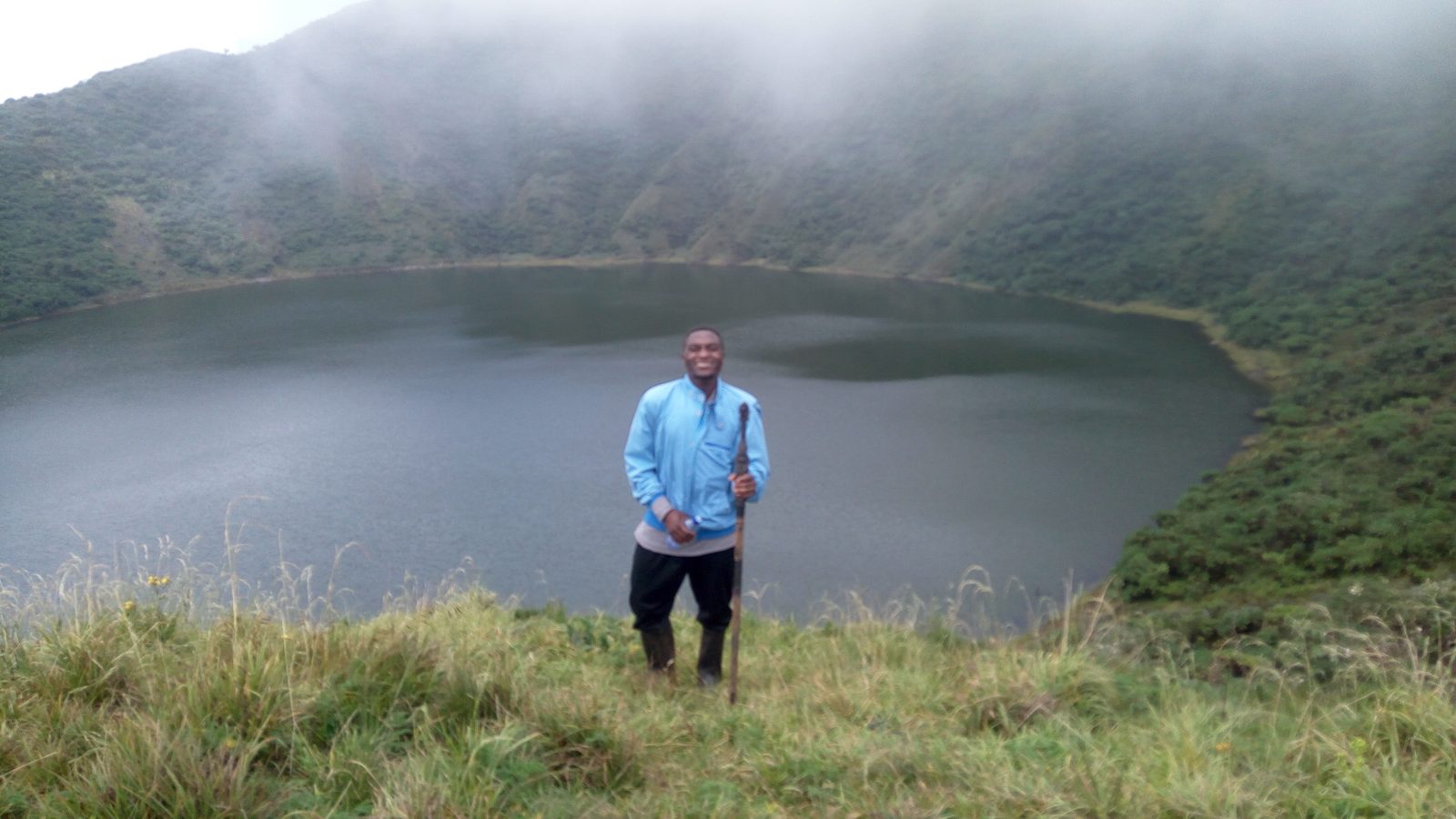 The crater lake at the summit of Mount Bisoke, Rwanda