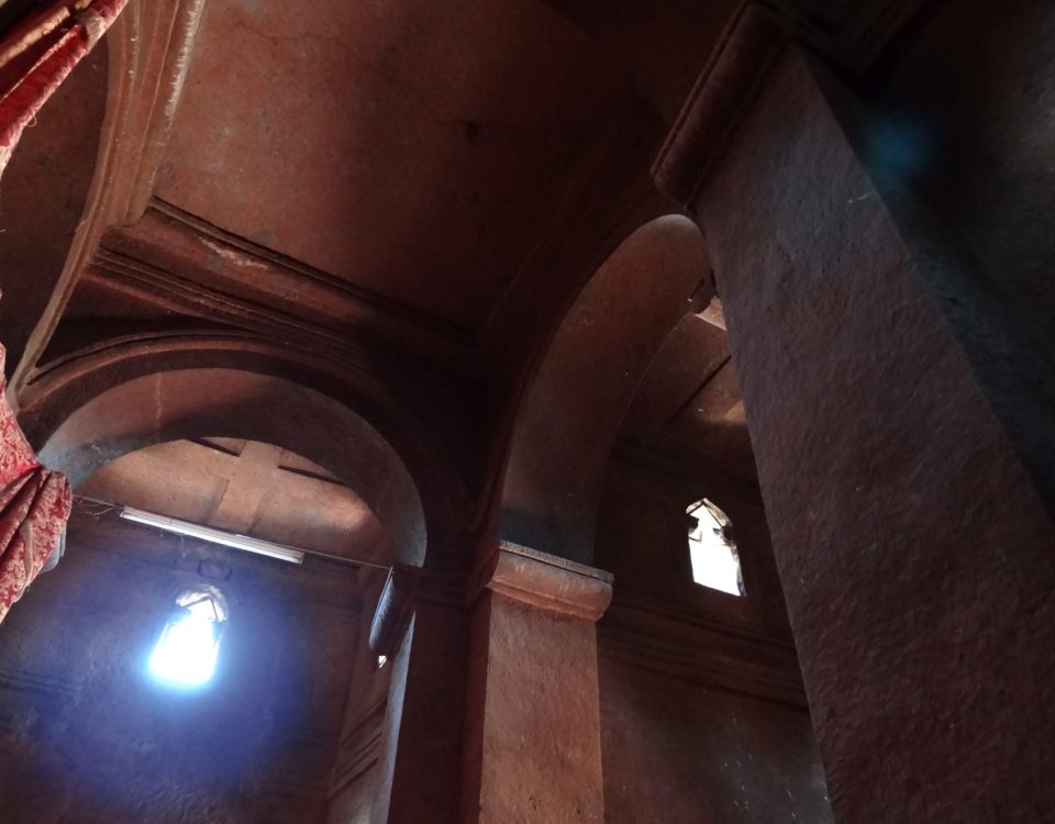 Interior arches carved from rock inside a Lalibela church, Ethiopia