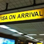 Visa on Arrival sign at an East African airport, relevant to Uganda visa requirements