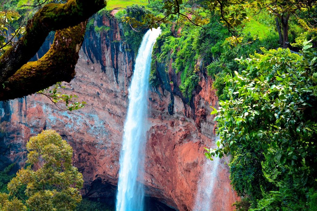 Sipi Falls Uganda featuring cascading waterfalls, lush landscapes, and scenic mountain views
